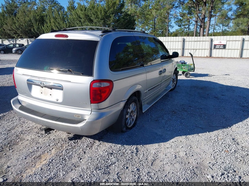 2001 Chrysler Town & country VIN 2C8GP54LX1R325529 IAAI salvage auction — RIGHT SIDE, Rebuildable (Florida), sold $300 on 2026-07-09 (photo 4)