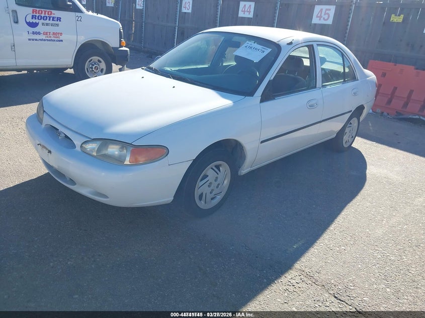 1999 Ford Escort VIN 1FAFP10P8XW221545 IAAI salvage auction — HAIL, Salvage (Idaho), sold $125 on 2026-07-07 (photo 2)