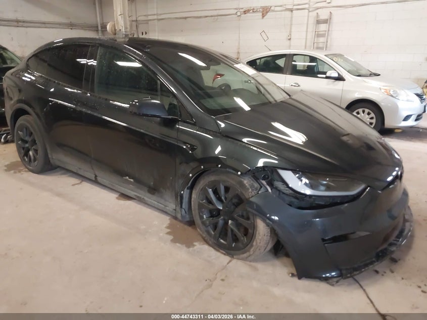 2024 Tesla Model X VIN 7SAXCDE57RF443443 — IAAI salvage auction photo