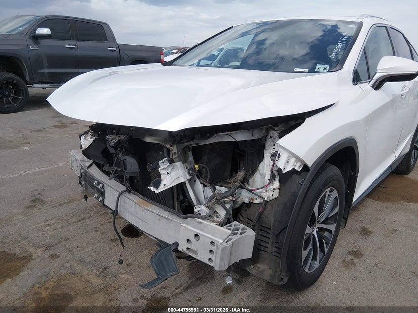 2021 Lexus Rx VIN 2T2HZMDA5MC299320 IAAI salvage auction — FRONT END, Wait Title, sold $12,200 on 2026-07-22 (photo 6)