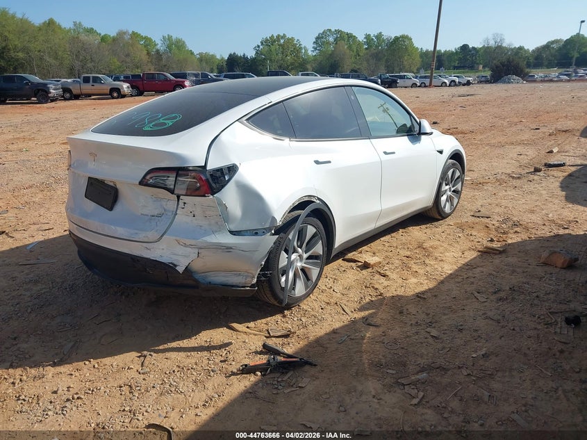 2023 Tesla Model y VIN 7SAYGAEE6PF758870 IAAI salvage auction — RIGHT REAR, Wait Title, sold $11,000 on 2026-07-16 (photo 4)