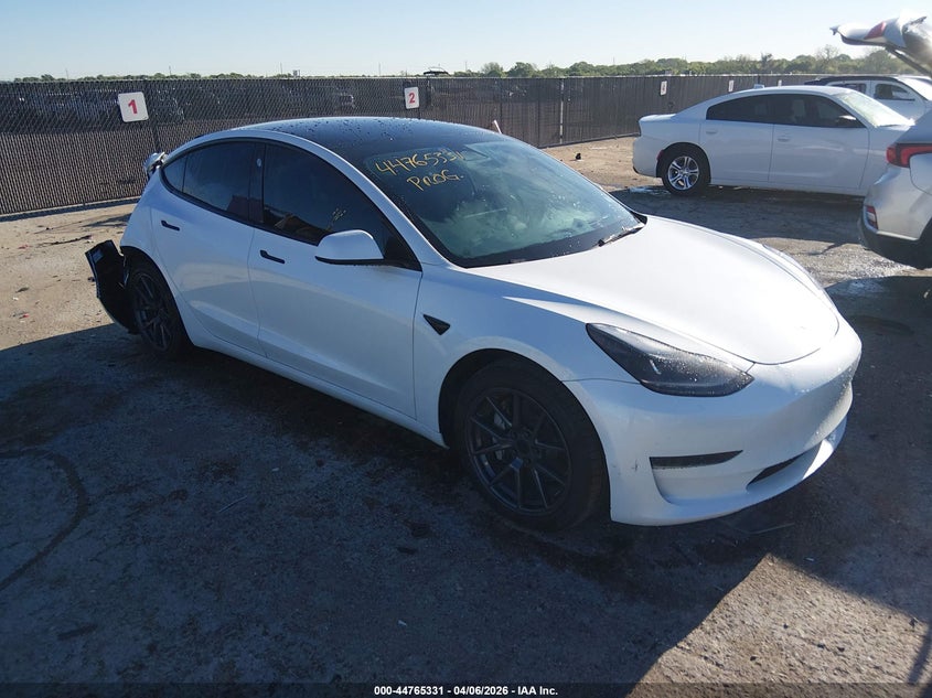 2023 Tesla Model 3 VIN 5YJ3E1EAXPF409396 IAAI salvage auction — RIGHT REAR, Original (Texas), sold $7,500 on 2026-07-09 (photo 1)