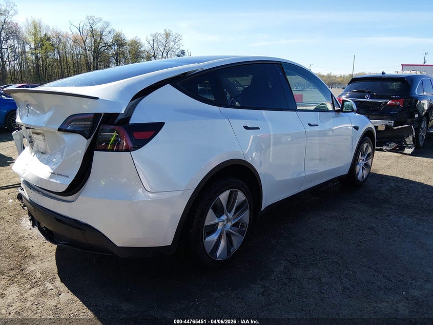 2023 Tesla Model y VIN 7SAYGDEE3PA097541 IAAI salvage auction — REAR END, Salvage Title, sold $7,900 on 2026-07-22 (photo 4)