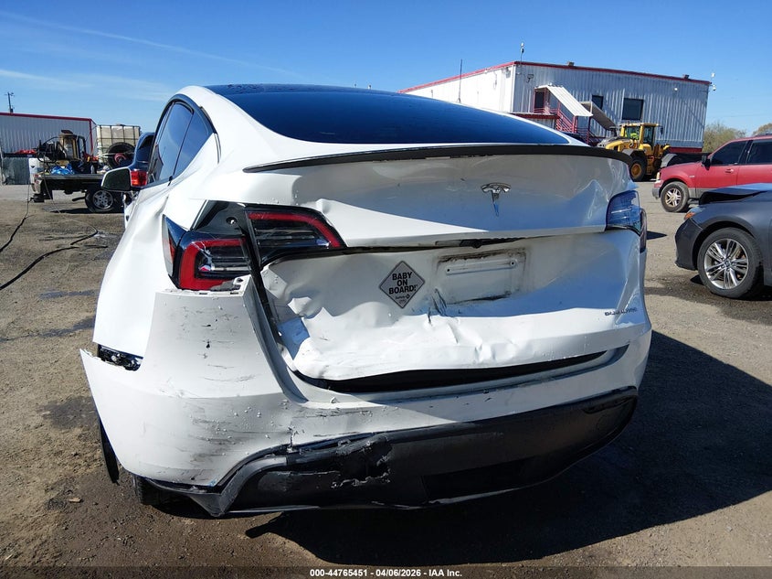 2023 Tesla Model y VIN 7SAYGDEE3PA097541 IAAI salvage auction — REAR END, Salvage Title, sold $7,900 on 2026-07-22 (photo 6)