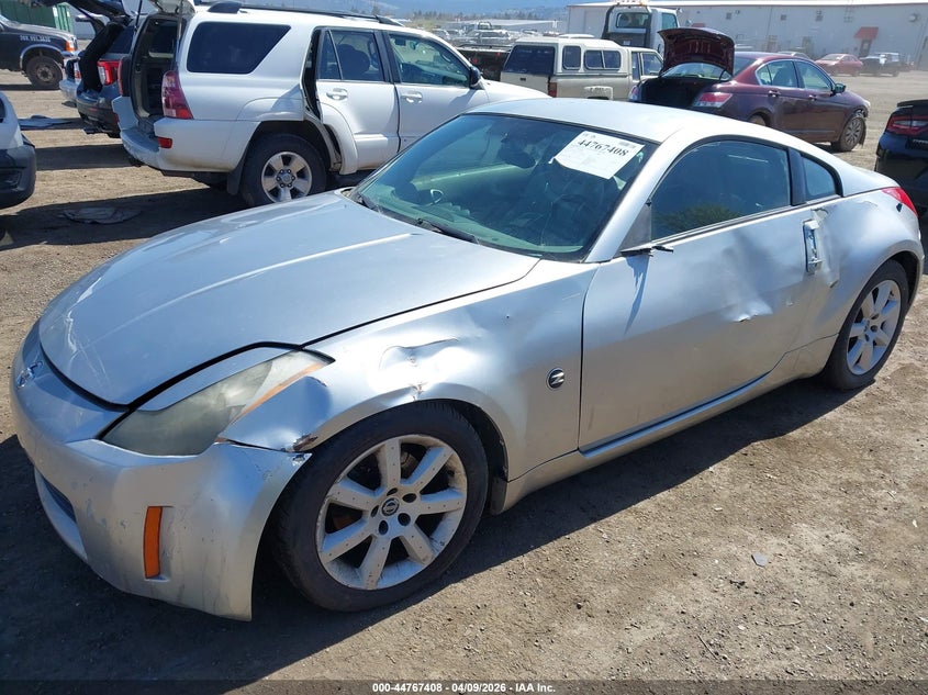 2004 Nissan 350z VIN JN1AZ34D34T152922 IAAI salvage auction — LEFT & RIGHT, Salvage (Texas), sold $525 on 2026-07-28 (photo 2)