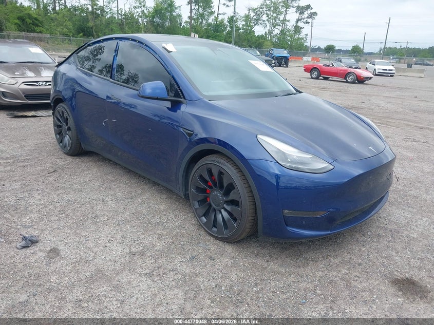 2022 Tesla Model Y VIN 7SAYGDEF3NF372818 IAAI salvage auction — Rear End, Rebuildable (Florida), sold $11,550 on 2026-04-30 (photo 1)