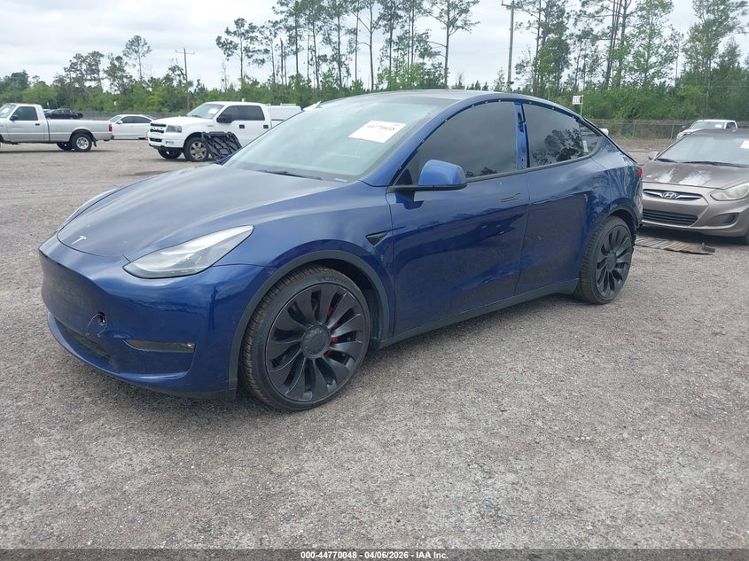 2022 Tesla Model Y VIN 7SAYGDEF3NF372818 IAAI salvage auction — Rear End, Rebuildable (Florida), sold $11,550 on 2026-04-30 (photo 2)
