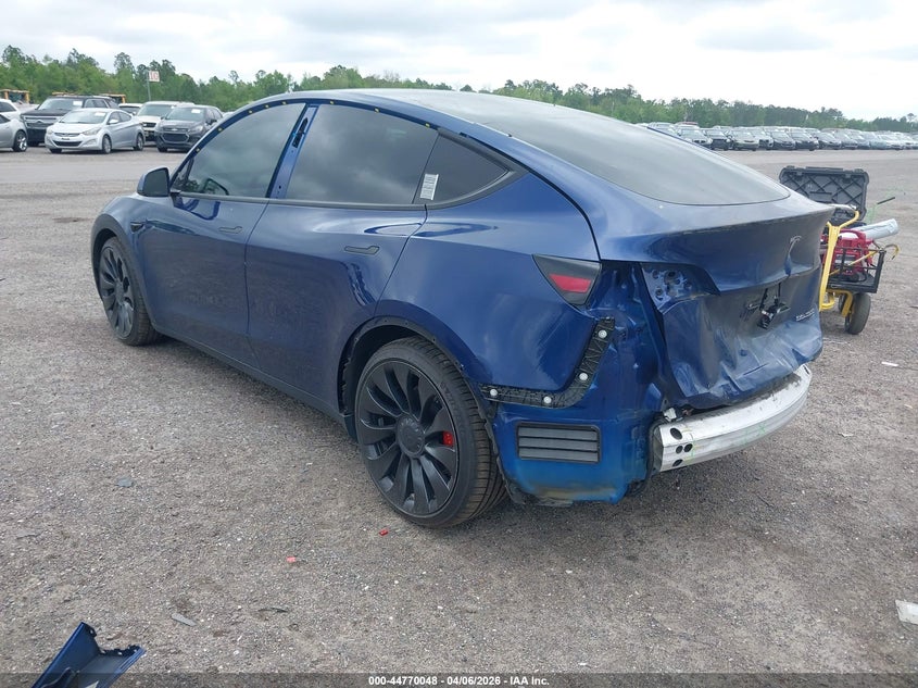 2022 Tesla Model Y VIN 7SAYGDEF3NF372818 IAAI salvage auction — Rear End, Rebuildable (Florida), sold $11,550 on 2026-04-30 (photo 3)