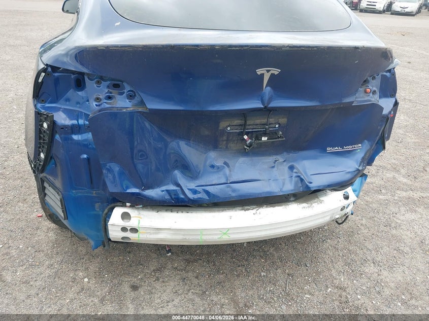 2022 Tesla Model Y VIN 7SAYGDEF3NF372818 IAAI salvage auction — Rear End, Rebuildable (Florida), sold $11,550 on 2026-04-30 (photo 6)
