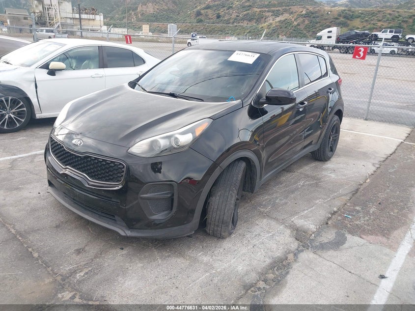 2018 Kia Sportage VIN KNDPM3AC7J7337156 IAAI salvage auction — SIDE, Wait Title, sold $2,050 on 2026-07-12 (photo 2)