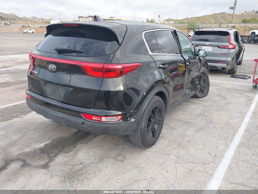 2018 Kia Sportage VIN KNDPM3AC7J7337156 IAAI salvage auction — SIDE, Wait Title, sold $2,050 on 2026-07-12 (photo 4)