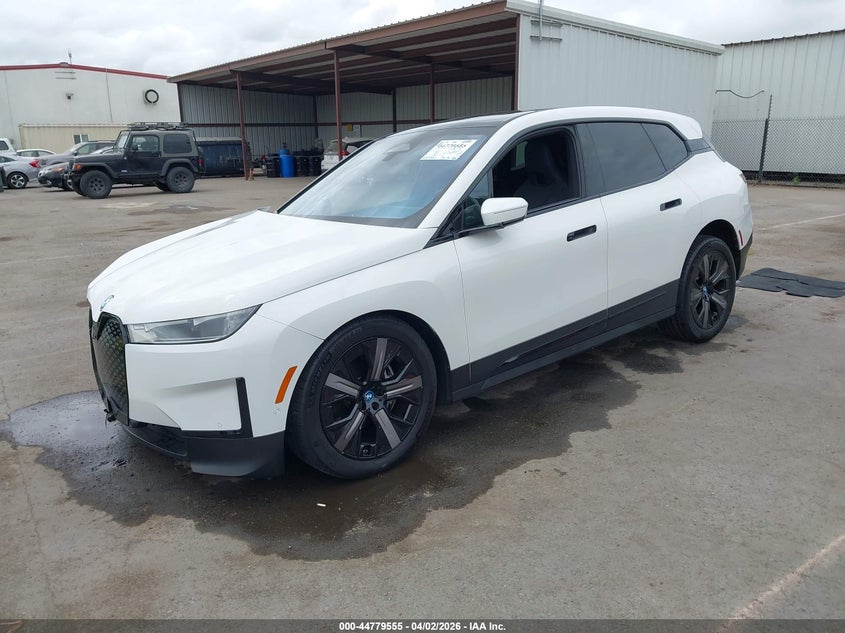 2024 BMW Ix VIN WB523CF04RCP25438 IAAI salvage auction — RIGHT FRONT, Wait Title, sold $21,900 on 2026-07-24 (photo 2)