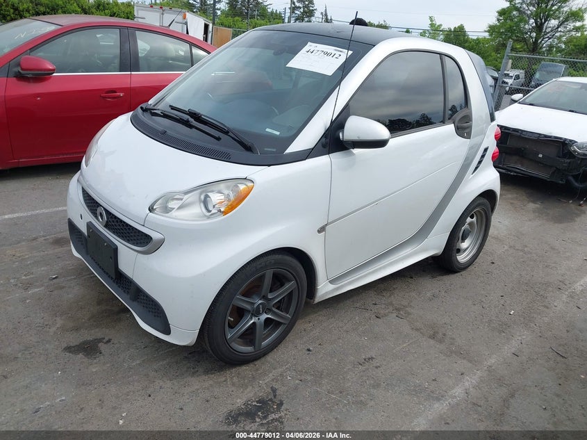 2015 Smart Fortwo VIN WMEEJ3BA1FK810634 IAAI salvage auction — NORMAL WEAR, Wait Title, sold $550 on 2026-07-13 (photo 2)