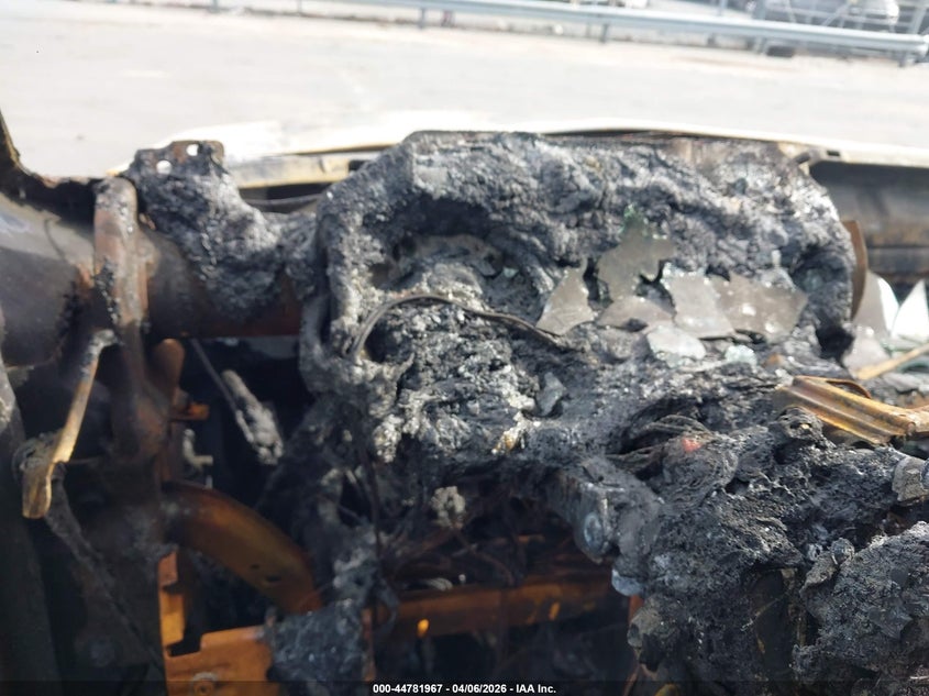 2012 Ford E 250 VIN 1FTNE2EW2CDB09833 IAAI salvage auction — EXTERIOR BURN, Junk Receipt (North Carolina), sold $125 on 2026-07-06 (photo 7)