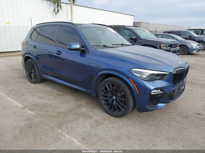 2021 BMW X5 VIN 5UXCR4C04M9G33559 IAAI salvage auction — Side, Salvage (California), sold $26,600 on 2026-05-04 (photo 1)