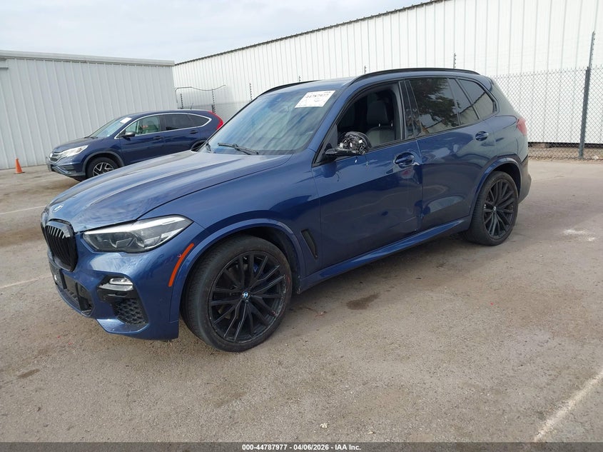 2021 BMW X5 VIN 5UXCR4C04M9G33559 IAAI salvage auction — Side, Salvage (California), sold $26,600 on 2026-05-04 (photo 2)