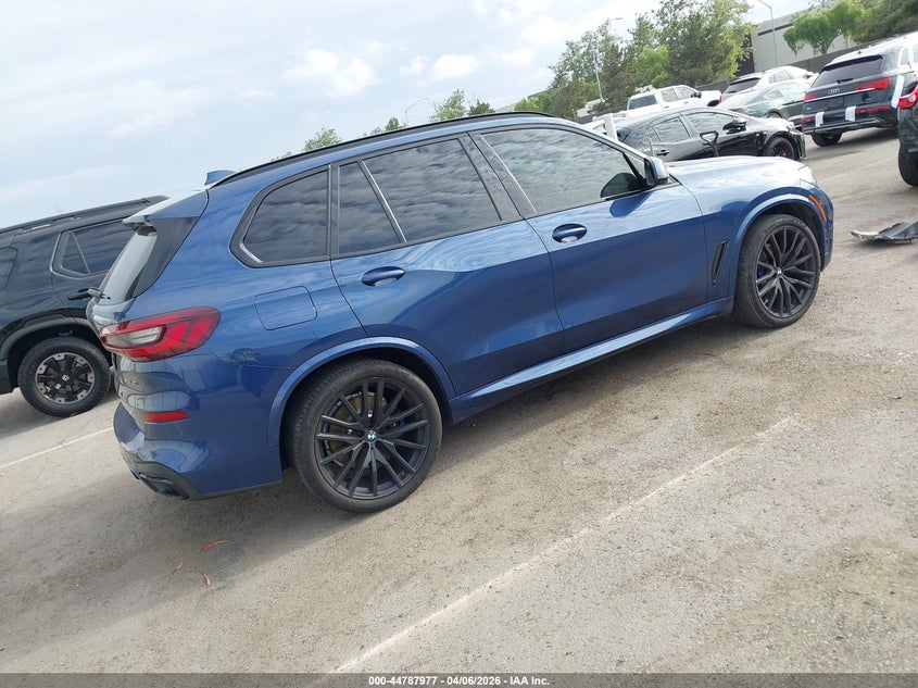 2021 BMW X5 VIN 5UXCR4C04M9G33559 IAAI salvage auction — Side, Salvage (California), sold $26,600 on 2026-05-04 (photo 4)
