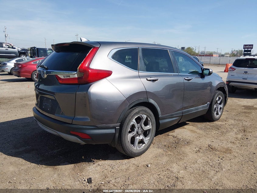 2018 Honda Cr-v VIN 7FARW1H54JE030587 IAAI salvage auction — RIGHT FRONT, Salvage (Kansas), sold $7,000 on 2026-07-17 (photo 4)