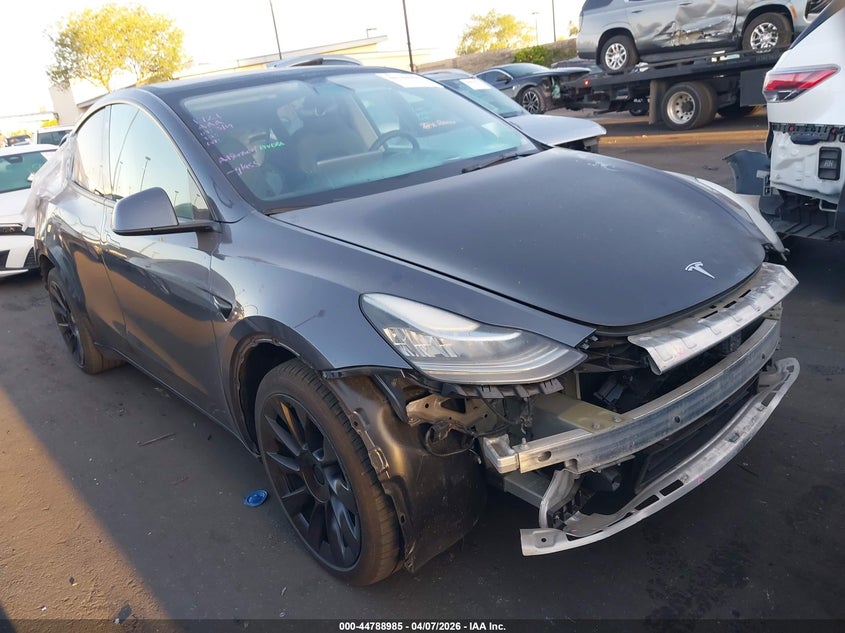 2021 Tesla Model y VIN 5YJYGAEE8MF180134 IAAI salvage auction — FRONT & REAR, Wait Title, sold $8,600 on 2026-07-08 (photo 1)