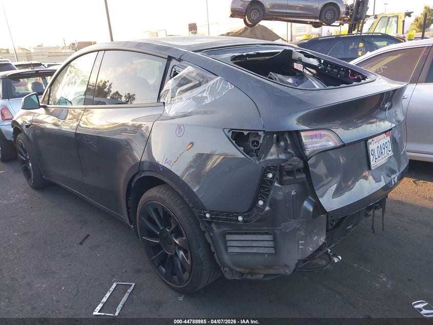 2021 Tesla Model y VIN 5YJYGAEE8MF180134 IAAI salvage auction — FRONT & REAR, Wait Title, sold $8,600 on 2026-07-08 (photo 3)