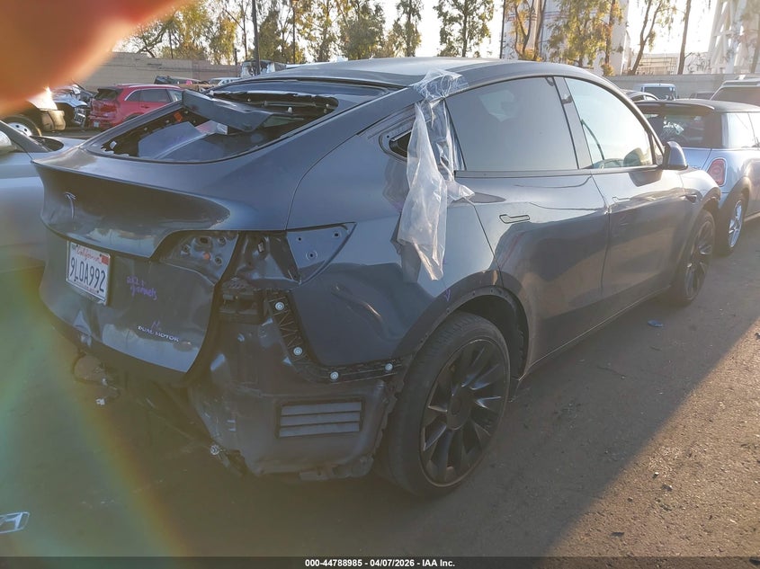 2021 Tesla Model y VIN 5YJYGAEE8MF180134 IAAI salvage auction — FRONT & REAR, Wait Title, sold $8,600 on 2026-07-08 (photo 4)