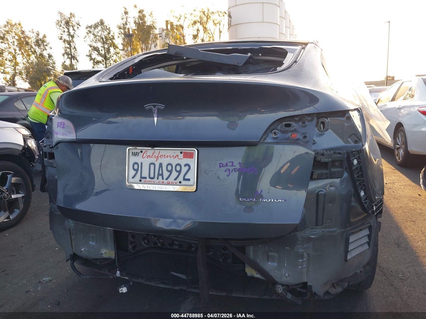 2021 Tesla Model y VIN 5YJYGAEE8MF180134 IAAI salvage auction — FRONT & REAR, Wait Title, sold $8,600 on 2026-07-08 (photo 6)