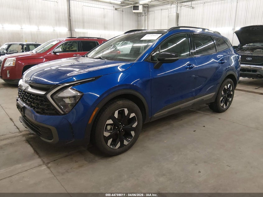 2023 Kia Sportage VIN 5XYK6CAF0PG025626 IAAI salvage auction — RIGHT FRONT, Salvage (Minnesota), sold $7,500 on 2026-07-28 (photo 2)