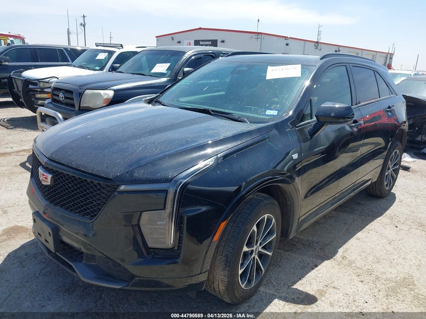 2024 Cadillac Xt4 VIN 1GYFZER40RF242147 IAAI salvage auction — REAR END, Salvage Title, sold $15,600 on 2026-07-14 (photo 2)