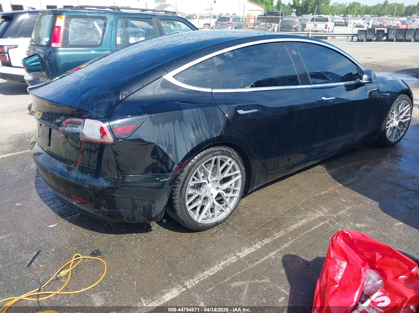 2020 Tesla Model 3 VIN 5YJ3E1EA6LF606690 IAAI salvage auction — SIDE, Salvage Title, sold $4,850 on 2026-07-20 (photo 4)