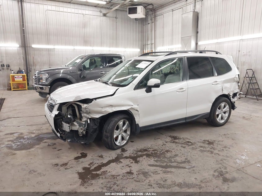 2014 Subaru Forester VIN JF2SJAPC8EH518430 IAAI salvage auction — FRONT & REAR, Salvage (Minnesota), sold $1,750 on 2026-07-14 (photo 2)