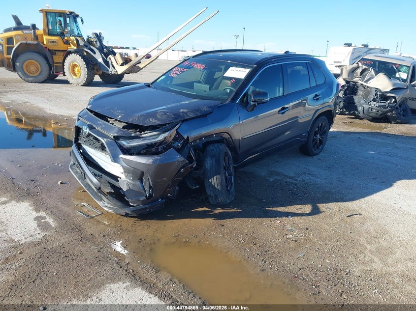 2025 Toyota Rav4 hybrid VIN JTME6RFV0SJ082563 IAAI salvage auction — SIDE, Original (Texas), sold $12,800 on 2026-07-22 (photo 2)