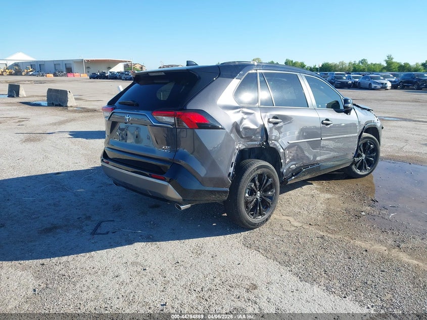 2025 Toyota Rav4 hybrid VIN JTME6RFV0SJ082563 IAAI salvage auction — SIDE, Original (Texas), sold $12,800 on 2026-07-22 (photo 4)