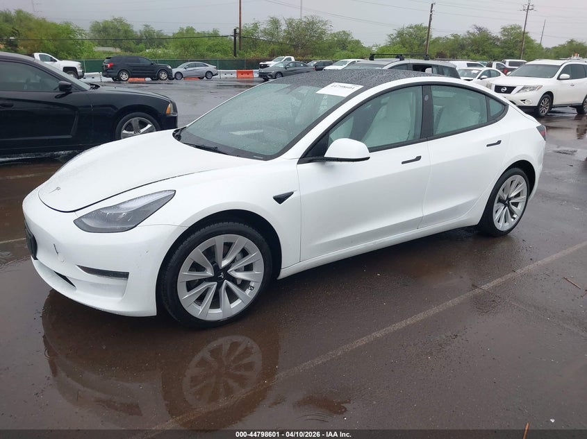 2023 Tesla Model 3 VIN 5YJ3E1EAXPF654182 IAAI salvage auction — RIGHT REAR, Salvage (Hawaii), sold $1,050 on 2026-07-23 (photo 2)
