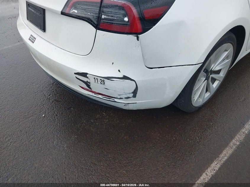 2023 Tesla Model 3 VIN 5YJ3E1EAXPF654182 IAAI salvage auction — RIGHT REAR, Salvage (Hawaii), sold $1,050 on 2026-07-23 (photo 6)