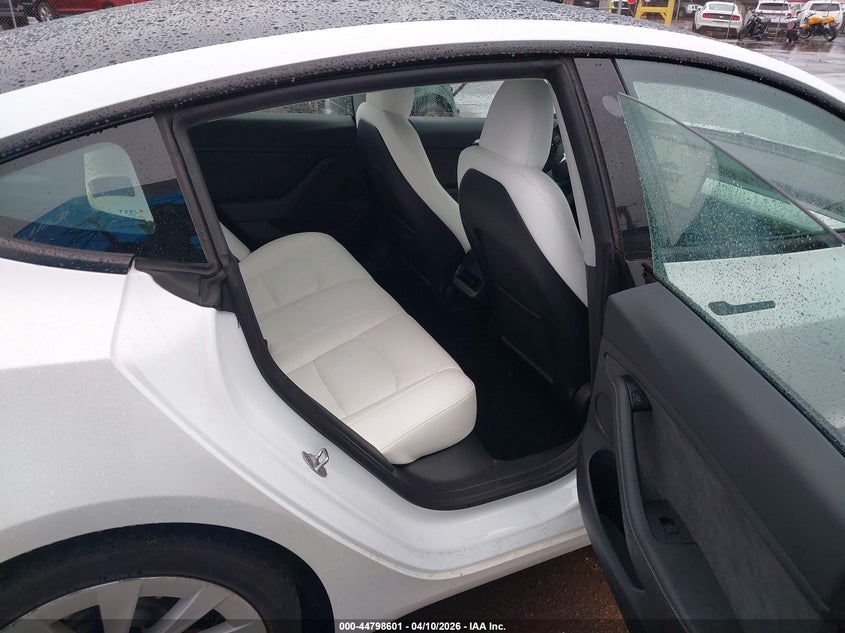 2023 Tesla Model 3 VIN 5YJ3E1EAXPF654182 IAAI salvage auction — RIGHT REAR, Salvage (Hawaii), sold $1,050 on 2026-07-23 (photo 8)