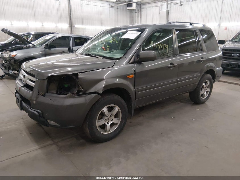 2008 Honda Pilot VIN 5FNYF18458B051392 IAAI salvage auction — LEFT FRONT, Prior Salvage (Minnesota), sold $600 on 2026-07-09 (photo 2)