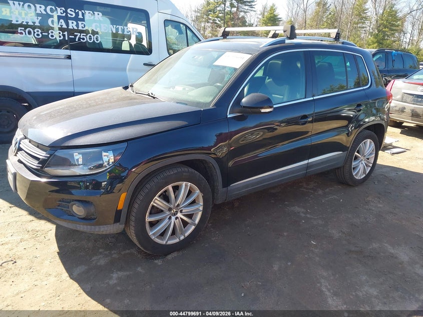 2012 Volkswagen Tiguan VIN WVGBV7AX2CW591203 IAAI salvage auction — FRESH WATER, Salvage Title, sold $425 on 2026-07-10 (photo 2)