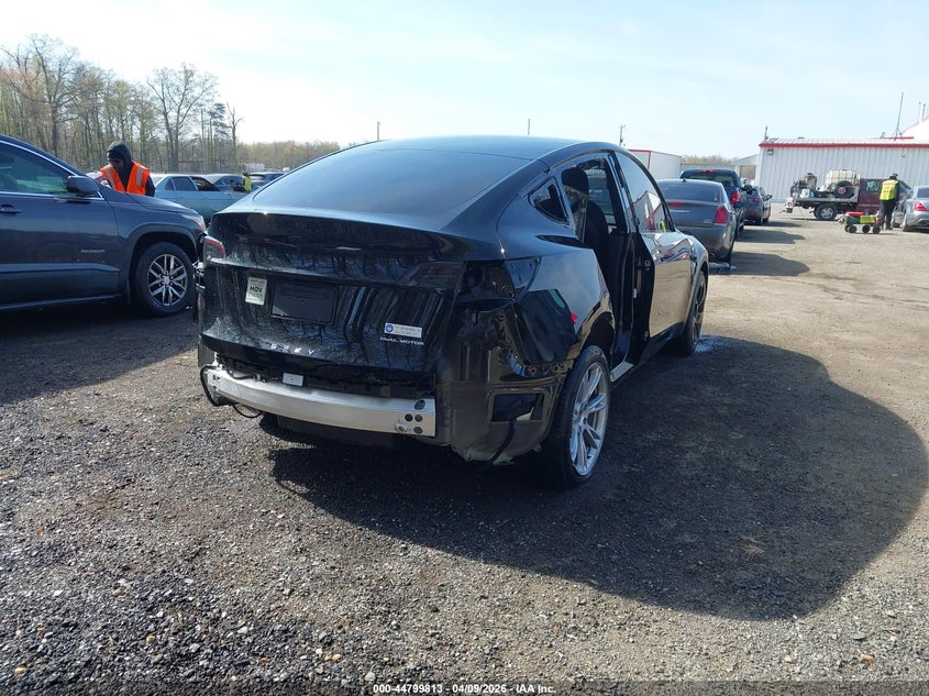 2024 Tesla Model y VIN 7SAYGDEE0RA218884 IAAI salvage auction — LEFT & RIGHT, Salvage Title, sold $13,600 on 2026-09-02 (photo 4)