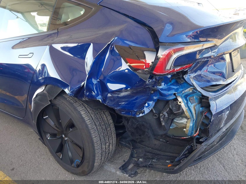 2025 Tesla Model 3 VIN 5YJ3E1EA6SF015323 IAAI salvage auction — LEFT REAR, Salvage Title, sold $12,600 on 2026-07-08 (photo 6)