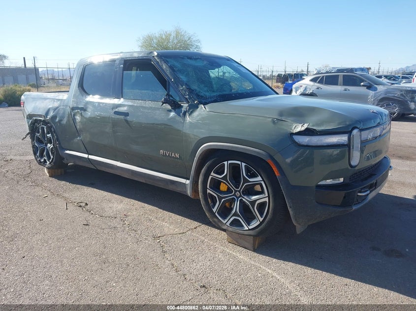 2022 Rivian R1t VIN 7FCTGAAL9NN009789 IAAI salvage auction — RIGHT SIDE, Salvage Title, sold $12,500 on 2026-08-28 (photo 1)