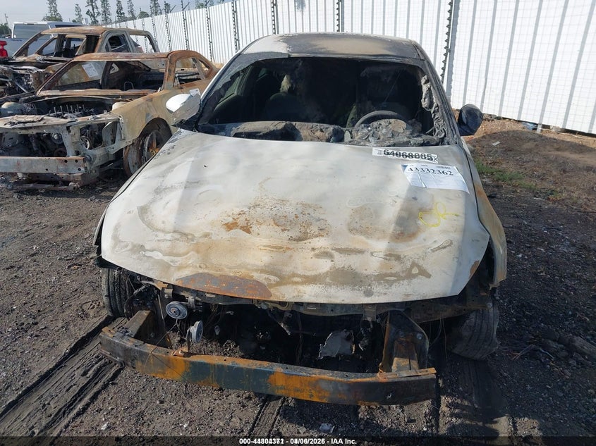 2020 Kia Optima VIN 5XXGT4L3XLG391244 IAAI salvage auction — ENGINE BURN, Salvage Title, sold $175 on 2026-07-07 (photo 6)