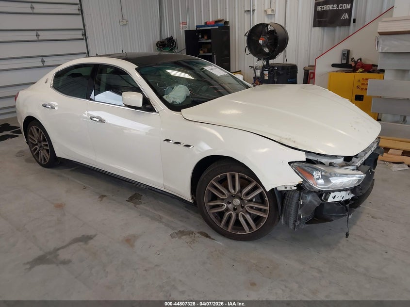 2014 Maserati Ghibli VIN ZAM57RTA2E1087679 IAAI salvage auction — FRONT & REAR, Salvage Title, sold $975 on 2026-07-30 (photo 1)