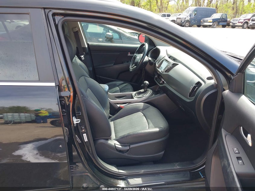 2015 Kia Sportage VIN KNDPCCAC7F7672878 IAAI salvage auction — HAIL, Salvage Title, sold $2,550 on 2026-07-15 (photo 5)