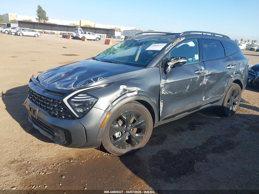 2025 Kia Sportage hybrid VIN KNDPZDDHXS7198494 IAAI salvage auction — LEFT & RIGHT, Wait Title, sold $5,200 on 2026-07-13 (photo 2)