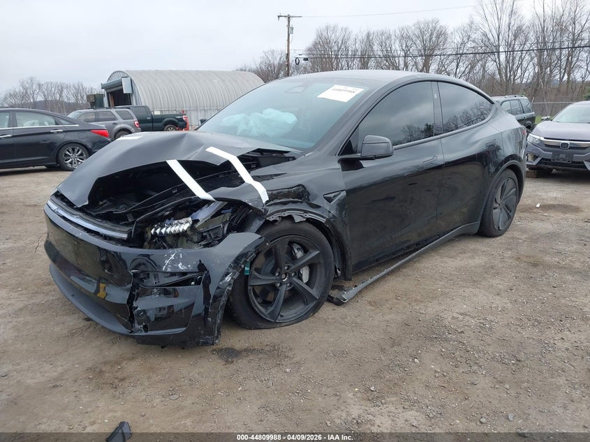 2026 Tesla Model y VIN 7SAYGDEE3TF554040 IAAI salvage auction — FRONT END, Salvage Title, sold $16,900 on 2026-08-29 (photo 2)