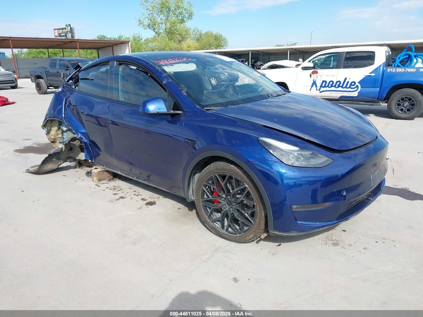 2022 Tesla Model y VIN 7SAYGDEF5NF505711 IAAI salvage auction — ROLLOVER, Original (Texas), sold $4,000 on 2026-07-29 (photo 1)
