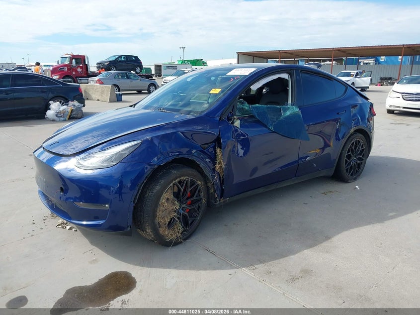 2022 Tesla Model y VIN 7SAYGDEF5NF505711 IAAI salvage auction — ROLLOVER, Original (Texas), sold $4,000 on 2026-07-29 (photo 2)