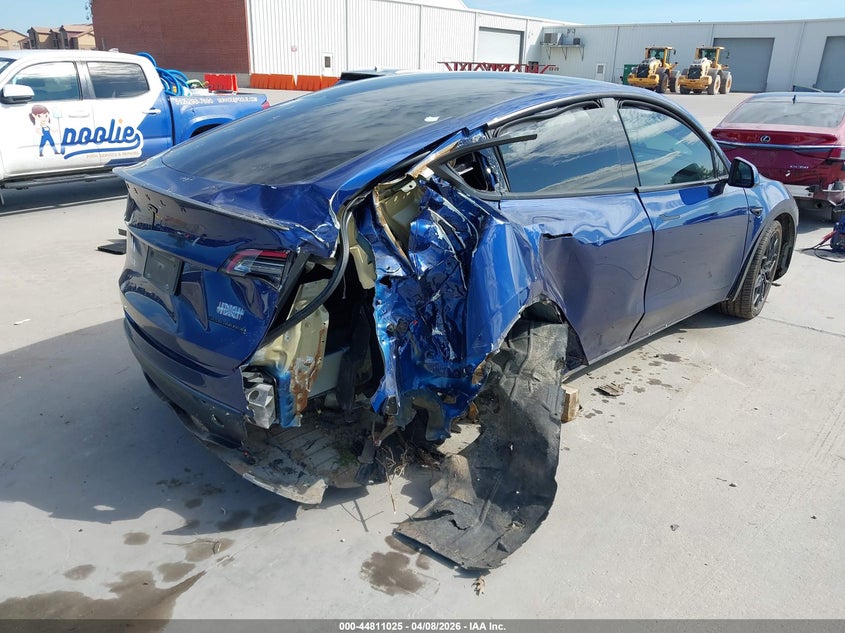 2022 Tesla Model y VIN 7SAYGDEF5NF505711 IAAI salvage auction — ROLLOVER, Original (Texas), sold $4,000 on 2026-07-29 (photo 6)