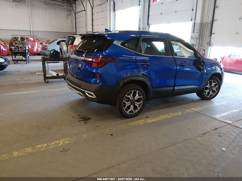 2023 Kia Seltos VIN KNDERCAAXP7466282 IAAI salvage auction — ROLLOVER, Salvage Title, sold $2,300 on 2026-07-23 (photo 4)