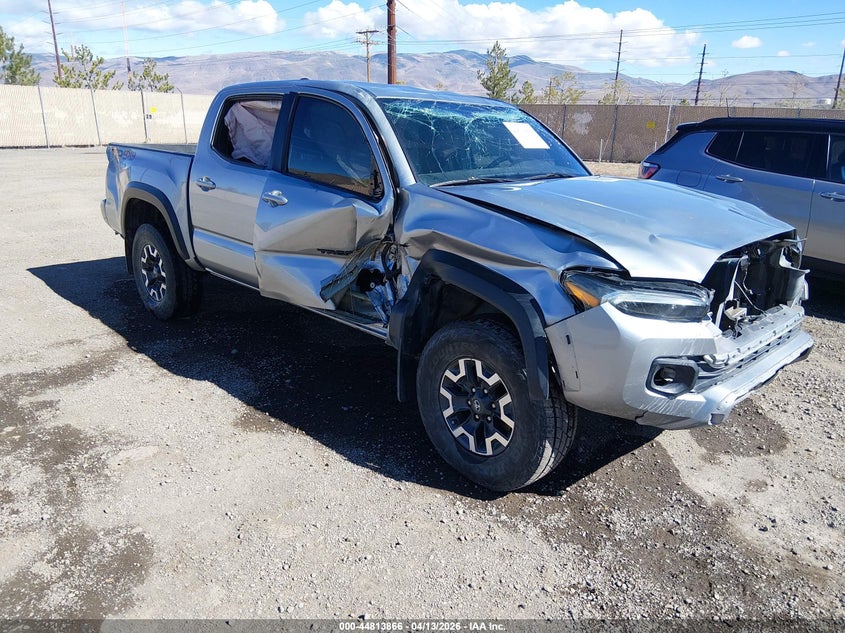 2021 Toyota Tacoma VIN 5TFCZ5AN6MX257428 IAAI salvage auction — ROLLOVER, Salvage (Nevada), sold $11,750 on 2026-07-10 (photo 1)